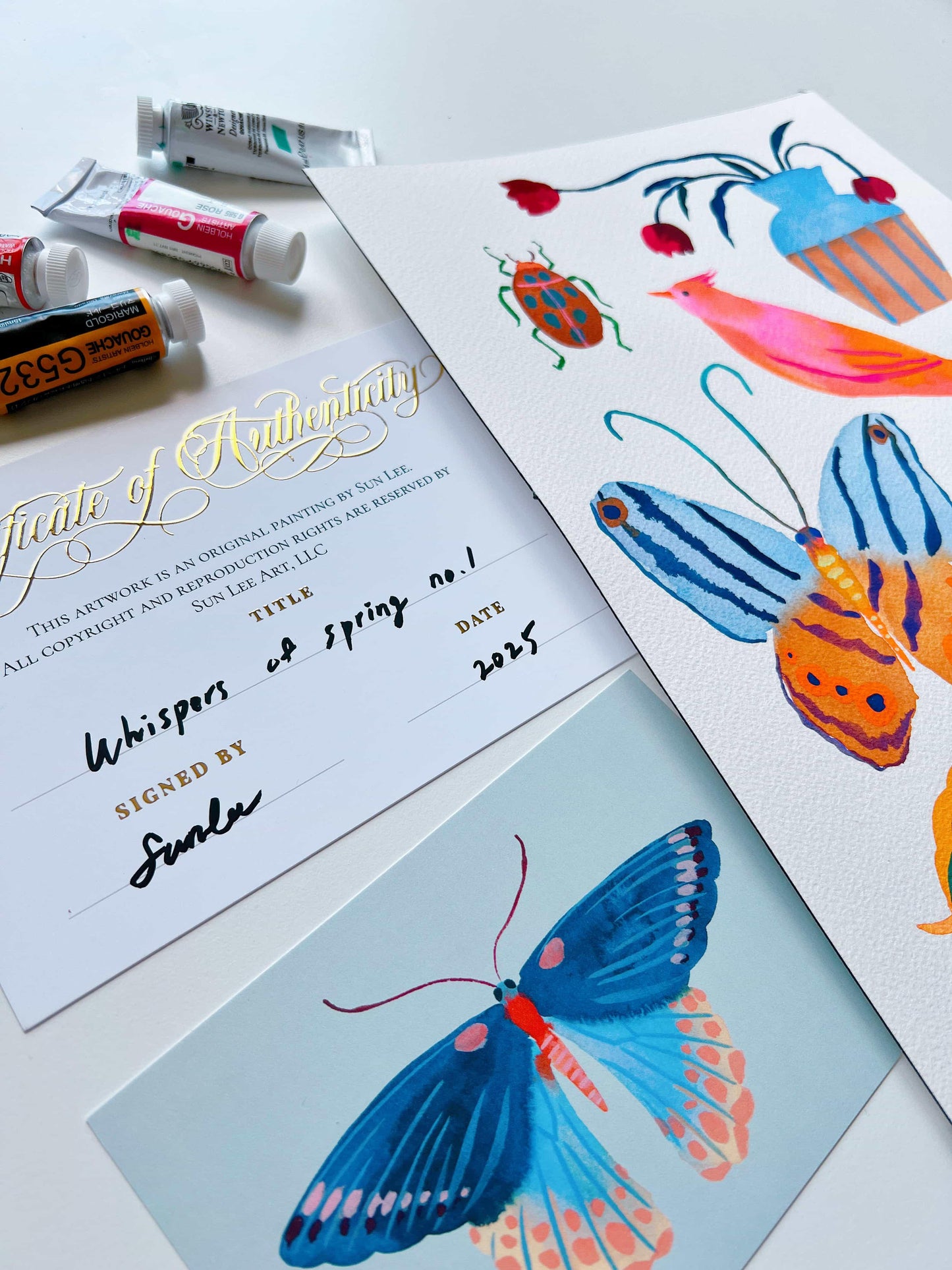 Original gouache, watercolor, and acrylic painting by Sun Lee from the 'Whispers of Spring' collection. This vibrant piece features a whimsical depiction of nature with bright flowers, butterflies, and birds, capturing the energy and beauty of spring. Perfect for nature lovers and those seeking aesthetic watercolor and gouache artwork, bringing joy and color to your space.