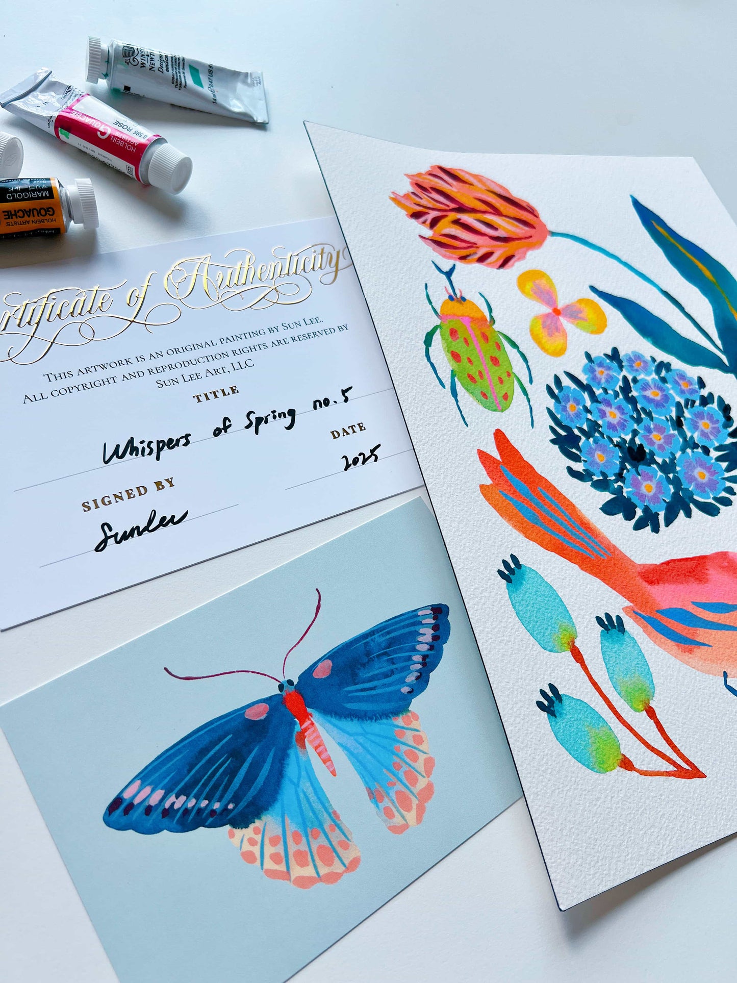 Original gouache, watercolor, and acrylic painting by Sun Lee from the 'Whispers of Spring' collection. This vibrant piece features a whimsical depiction of nature with bright flowers, butterflies, and birds, capturing the energy and beauty of spring. Perfect for nature lovers and those seeking aesthetic watercolor and gouache artwork, bringing joy and color to your space.