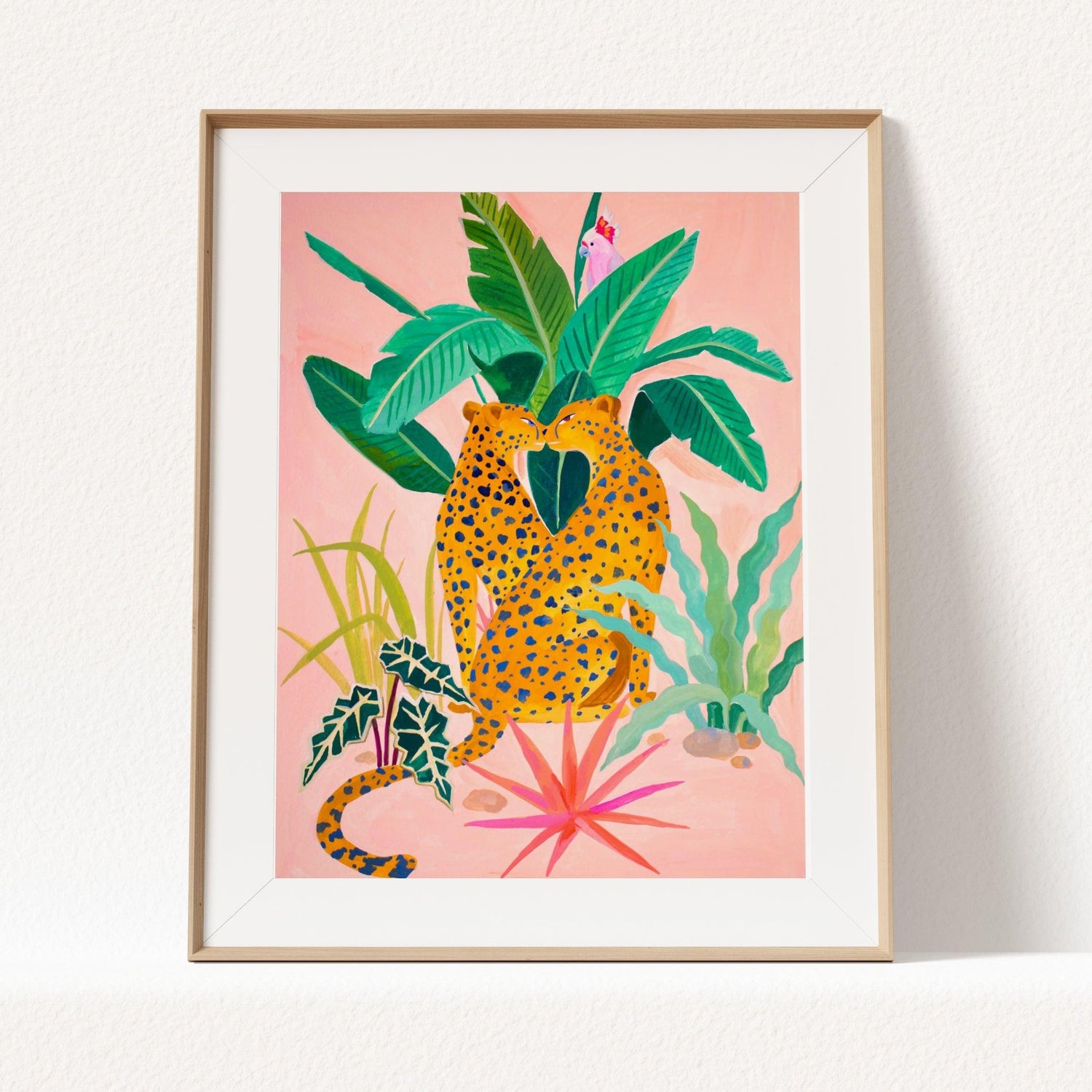 Hand-painted gouache artwork of a cheetah surrounded by botanical elements. Part of Sun Lee’s vibrant cat print collection.