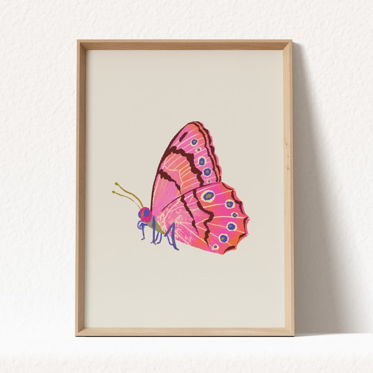 Framed artwork of a pink butterfly on a white background