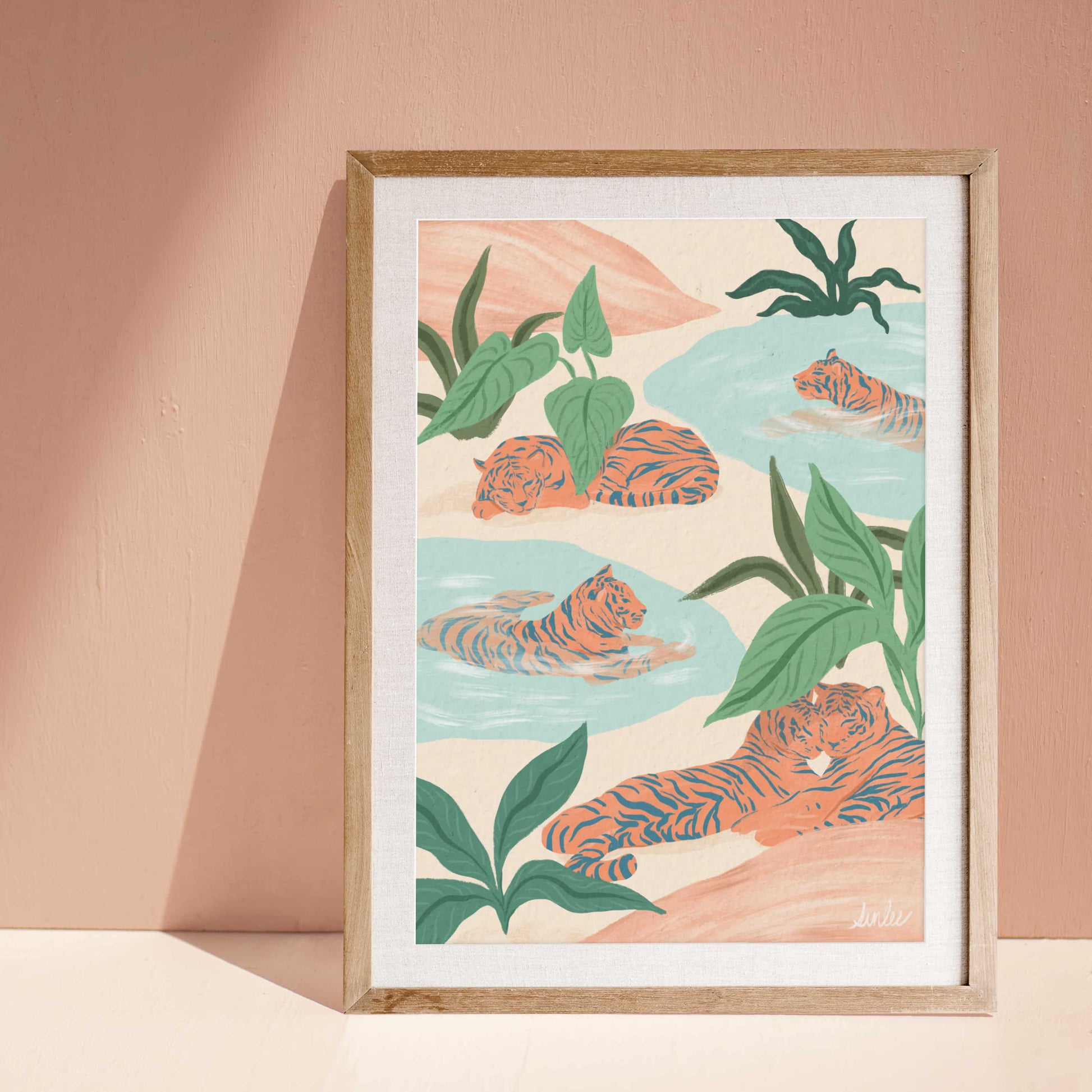 Peaceful tiger art print featuring resting tigers in a serene natural landscape with soft, muted colors.