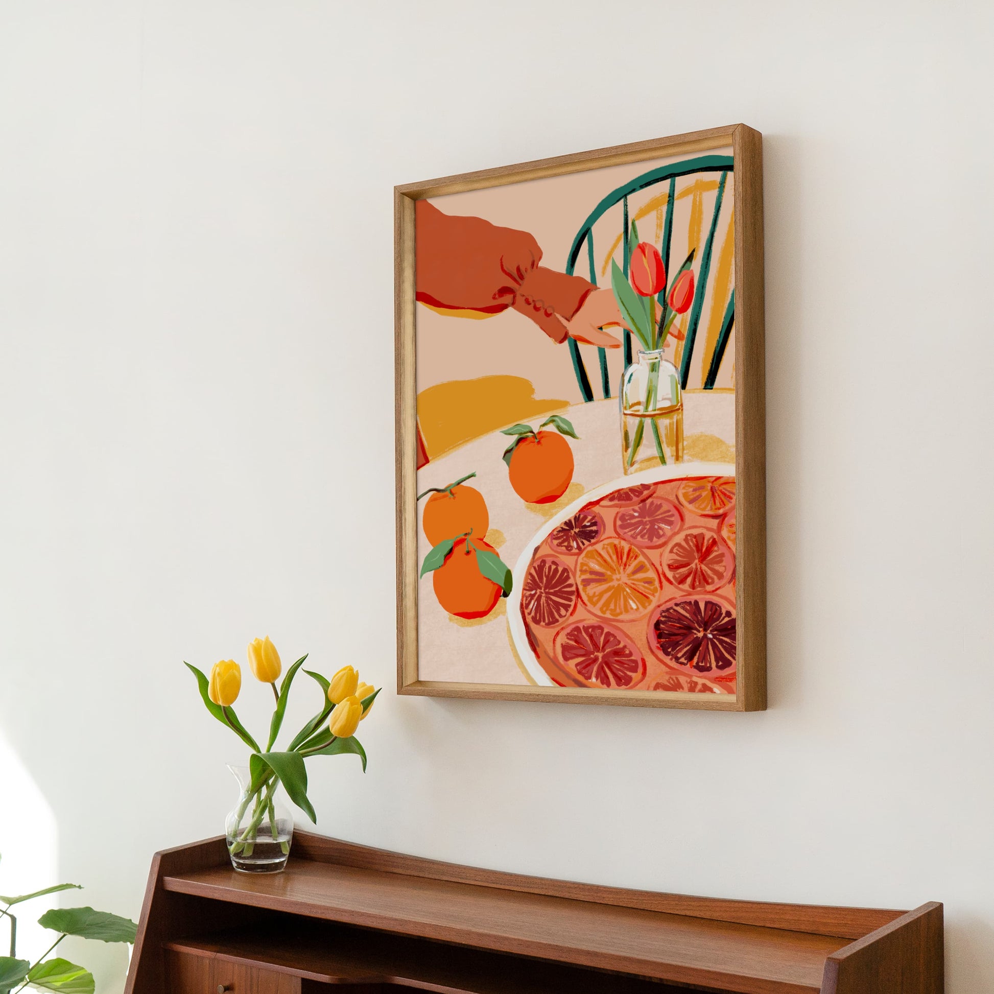 Rustic autumn still life with earthy colors, cake on a pedestal, and fresh seasonal fruit.