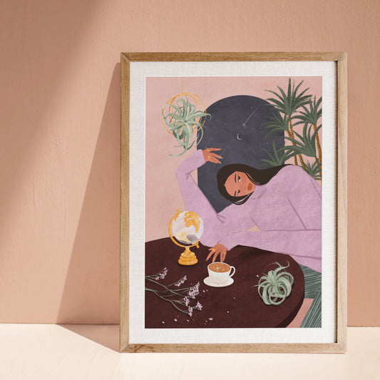Art print of a woman in warm clothing resting beside a table with a latte, plants, and a globe, surrounded by houseplants and an arched window showing a moonlit night sky.