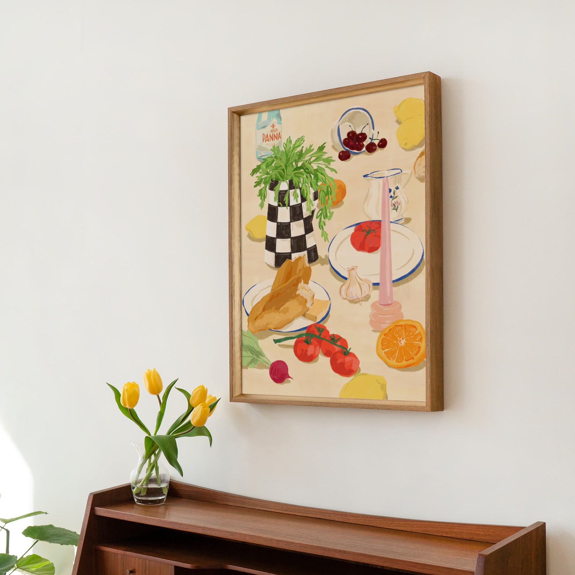 Colorful kitchen table scene with cherries, radish, lemons, baguette, and fresh herbs.

