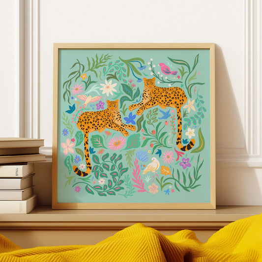 Playful illustration of cheetahs surrounded by colorful flowers, birds, and nature elements – vibrant and fun animal art print for nature-inspired home decor