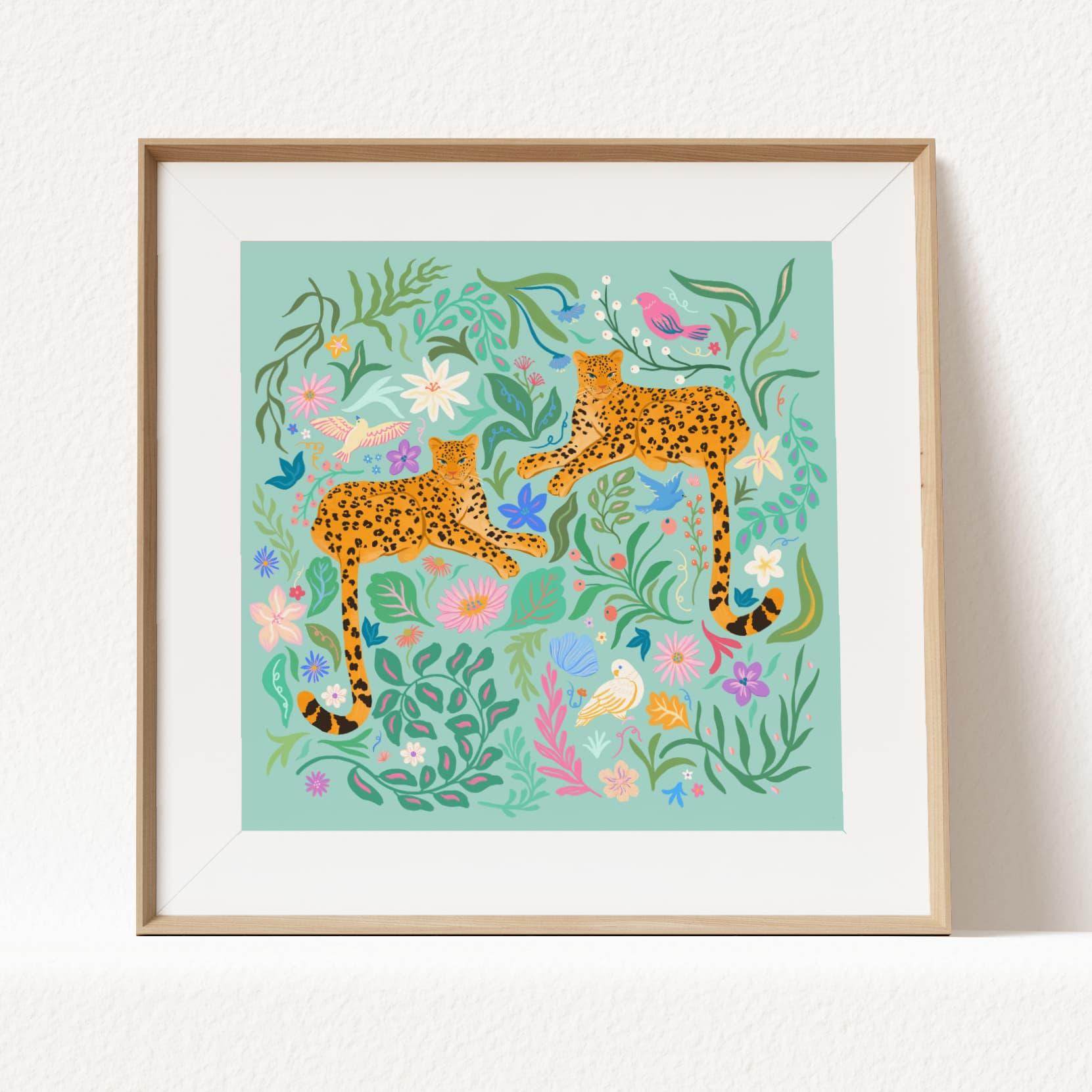 Playful illustration of cheetahs surrounded by colorful flowers, birds, and nature elements – vibrant and fun animal art print for nature-inspired home decor