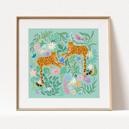 Playful illustration of cheetahs surrounded by colorful flowers, birds, and nature elements – vibrant and fun animal art print for nature-inspired home decor