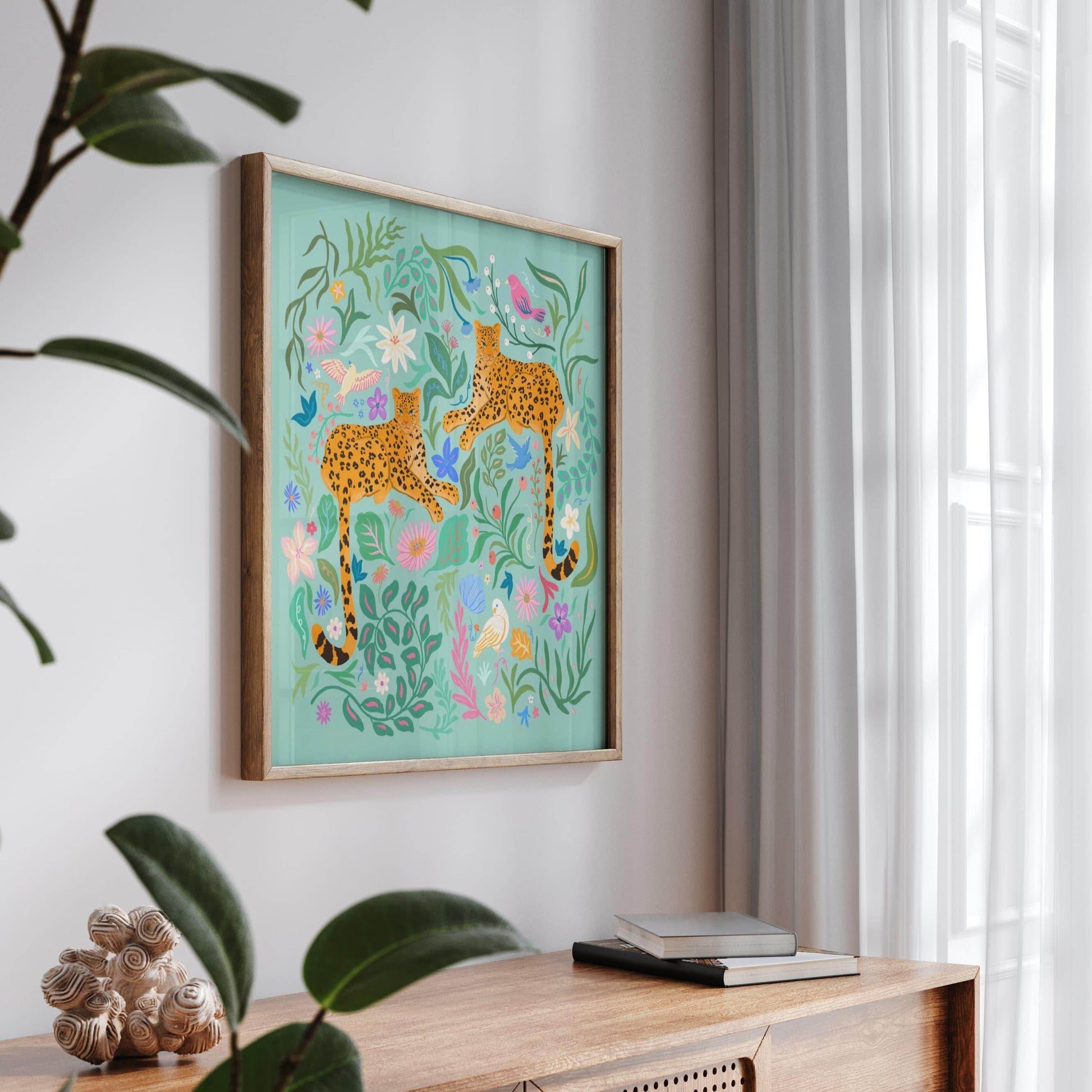 Playful illustration of cheetahs surrounded by colorful flowers, birds, and nature elements – vibrant and fun animal art print for nature-inspired home decor