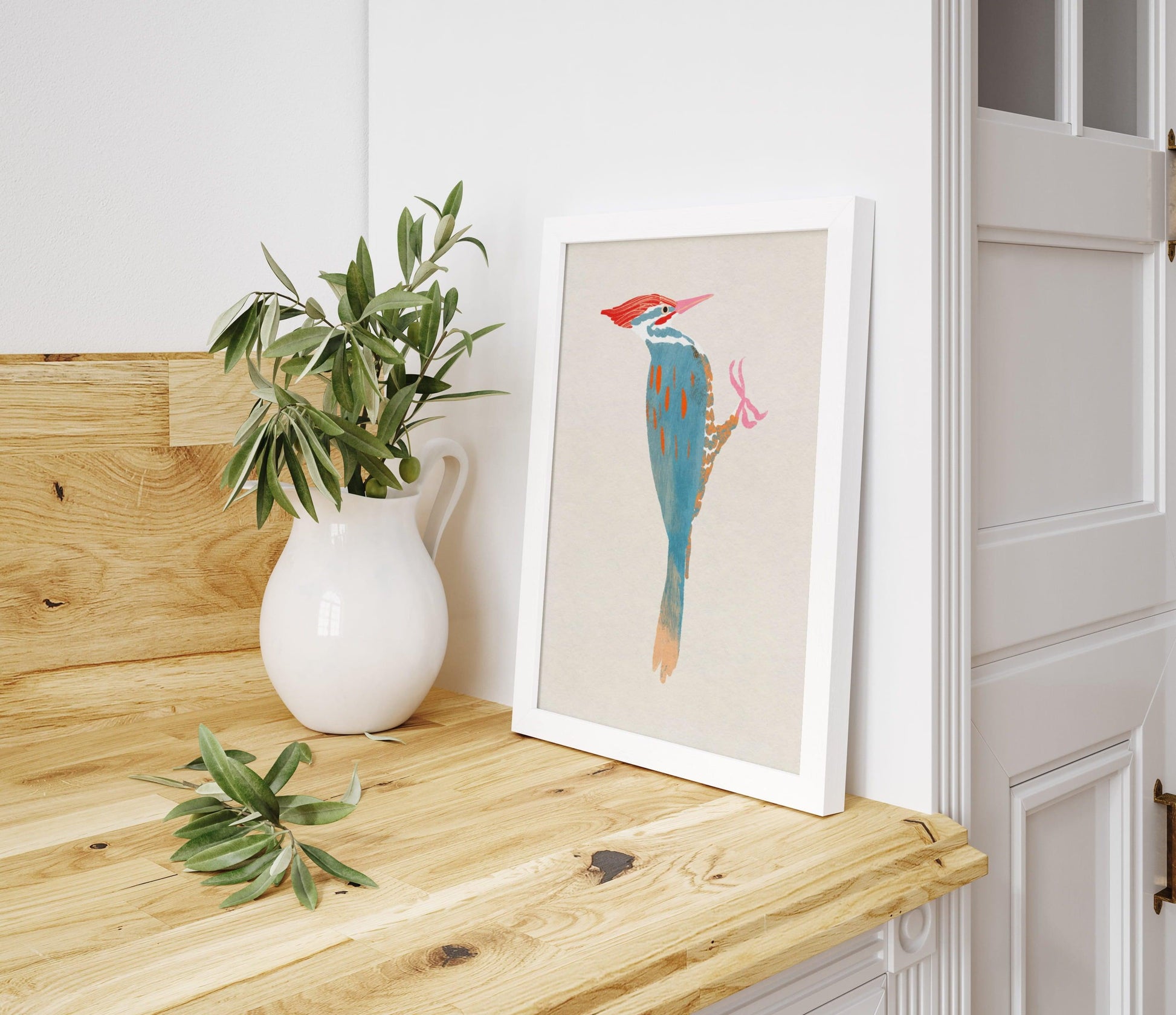 A whimsical art print of a Pileated Woodpecker, illustrated in vibrant colors and playful details. The bird is perched in a natural setting, capturing its bold features and lively spirit—an artistic tribute to this striking forest visitor.