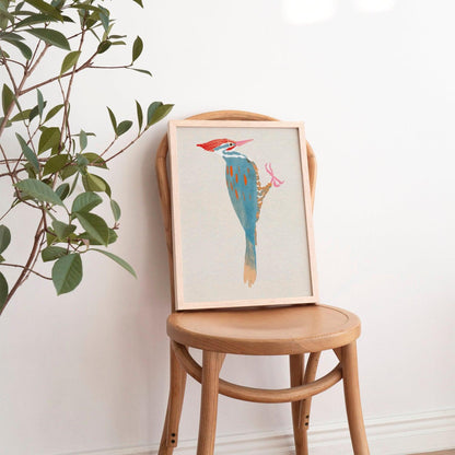 A whimsical art print of a Pileated Woodpecker, illustrated in vibrant colors and playful details. The bird is perched in a natural setting, capturing its bold features and lively spirit—an artistic tribute to this striking forest visitor.