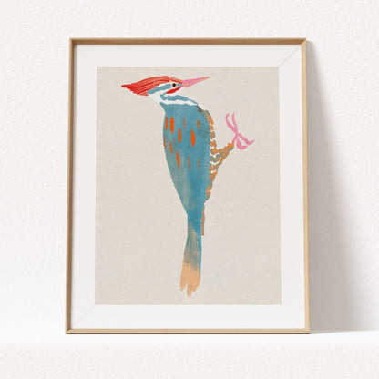 A whimsical art print of a Pileated Woodpecker, illustrated in vibrant colors and playful details. The bird is perched in a natural setting, capturing its bold features and lively spirit—an artistic tribute to this striking forest visitor.