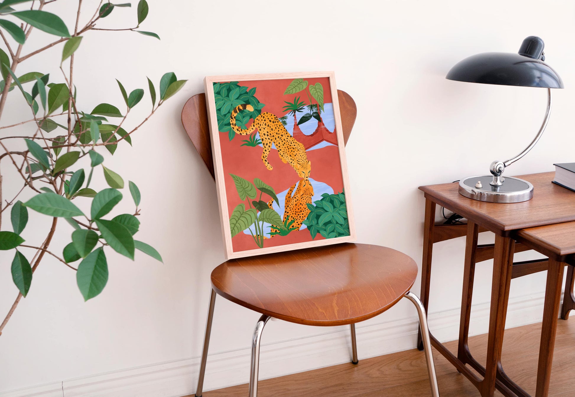 Illustration of a cheetah drinking water from a serene pond, with a beautiful reflection – earthy mud tones and vibrant greens in tranquil nature art print for modern home decor