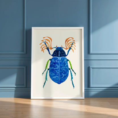 Gouache painting of a vibrant blue beetle with intricate wing details and iridescent hues, centered on a light background. The artwork highlights the beetle’s delicate textures and bold color.
