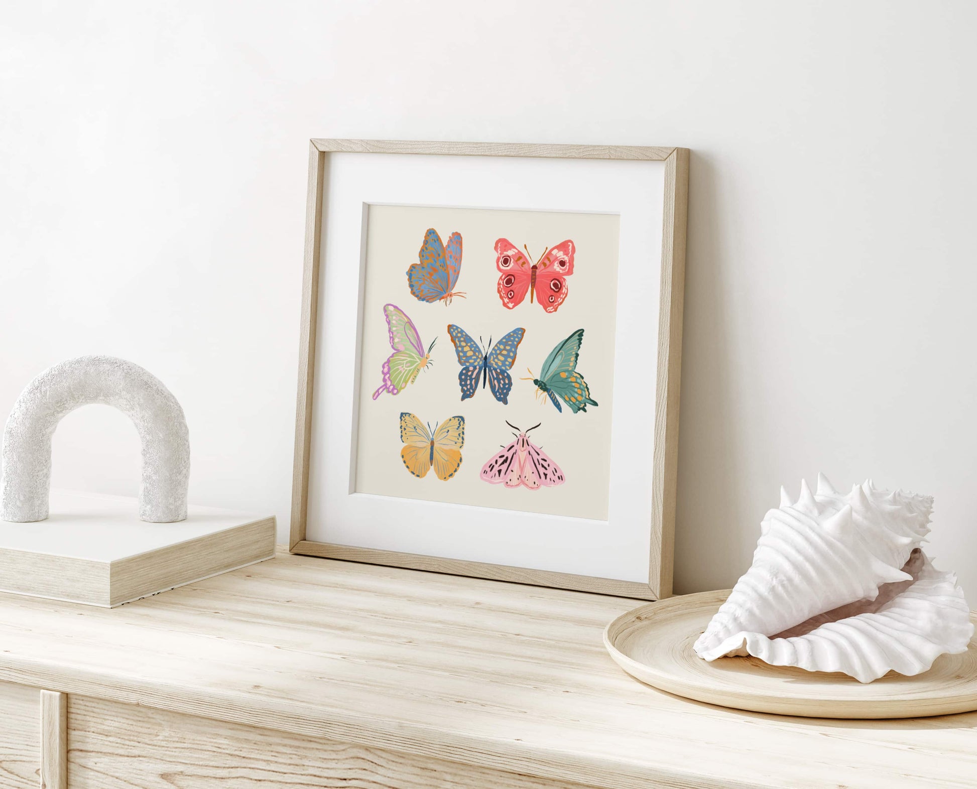 Softly colored butterflies and moths illustrated in a calm, delicate palette.