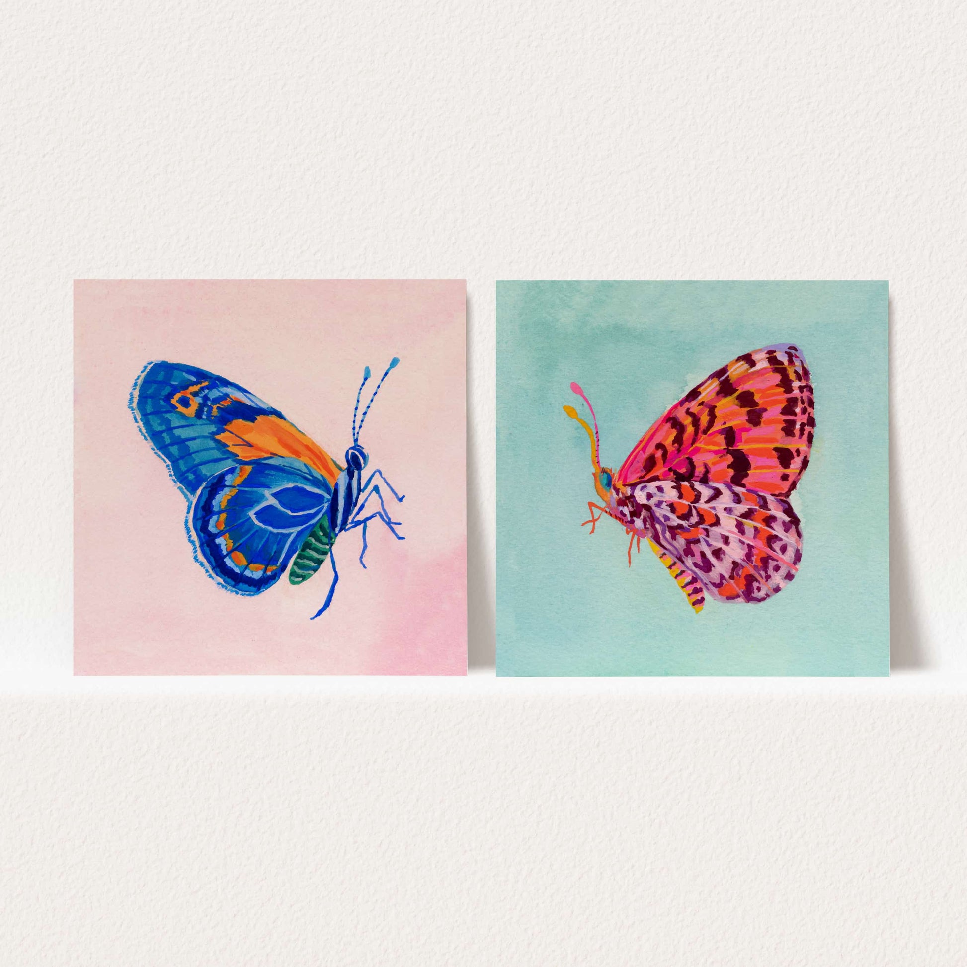 Set of two butterfly art prints, blue and pink, painted in gouache and watercolor