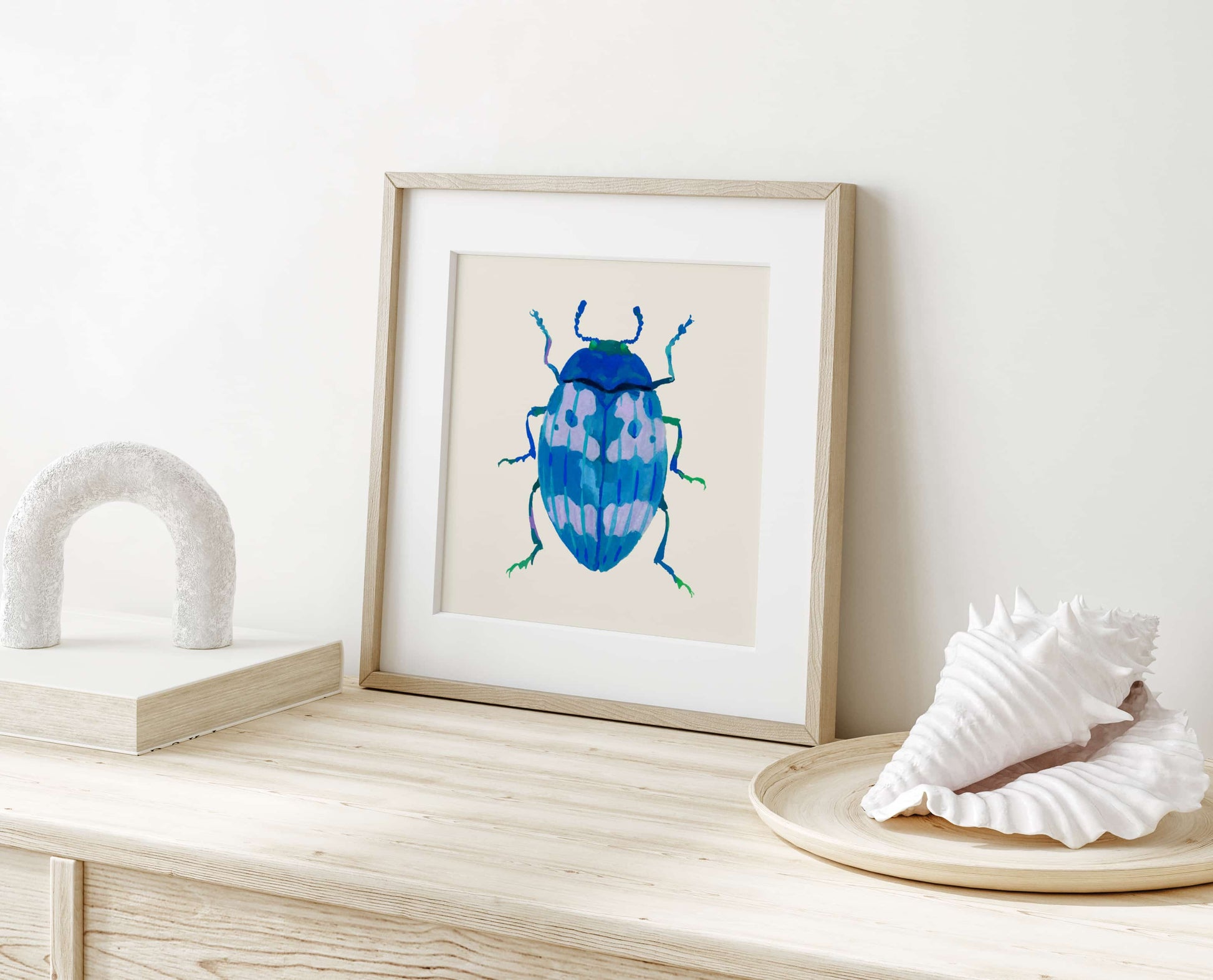 rt print of a beetle in soft cerulean and blue hues, hand-painted in gouache with delicate textures and a nature-inspired form.