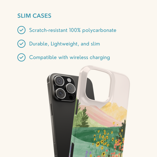 Phone case with a scenic design of mountains and flowers by Sun Lee