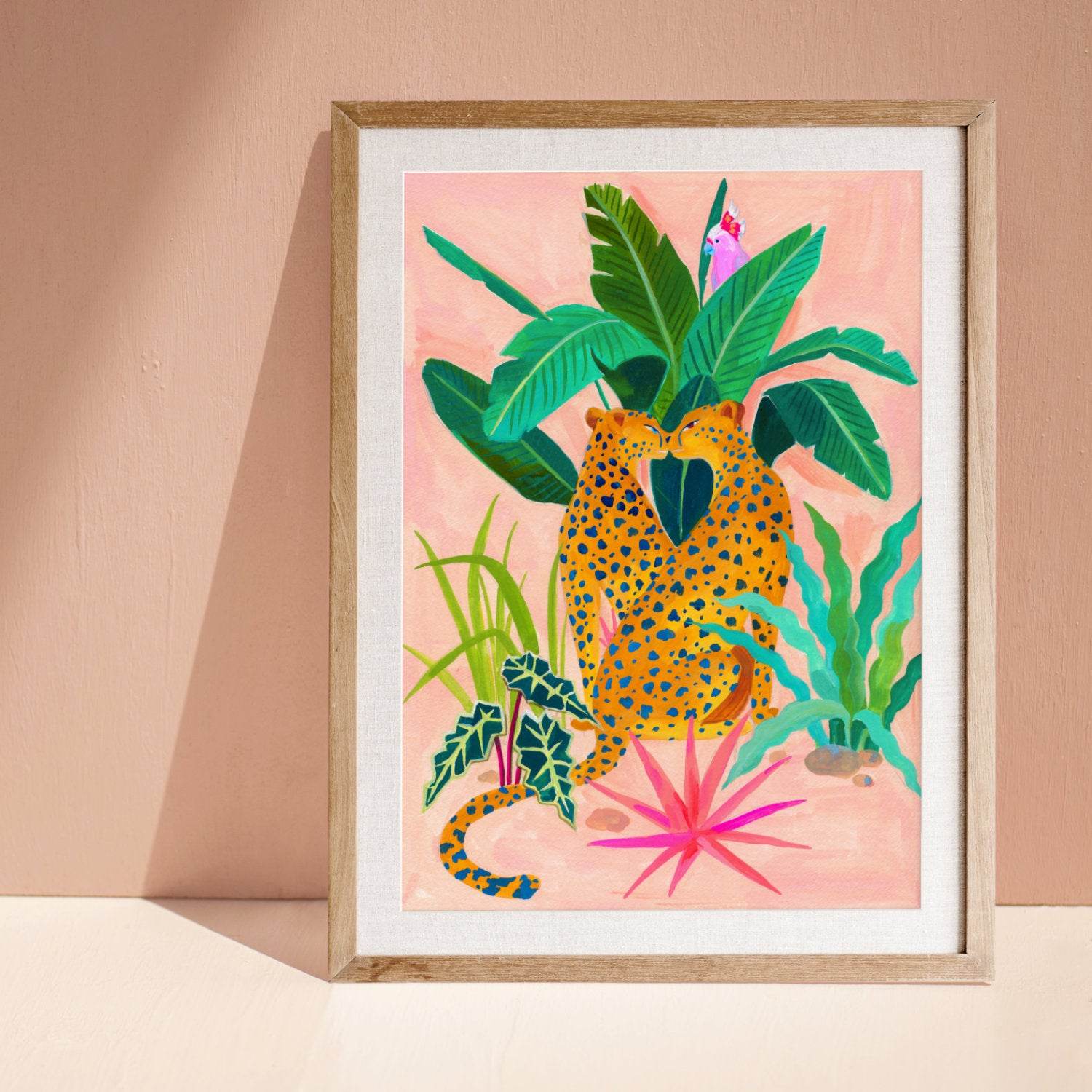 Gouache painting by artist Sun Lee features two cheetahs and tropical flora. 