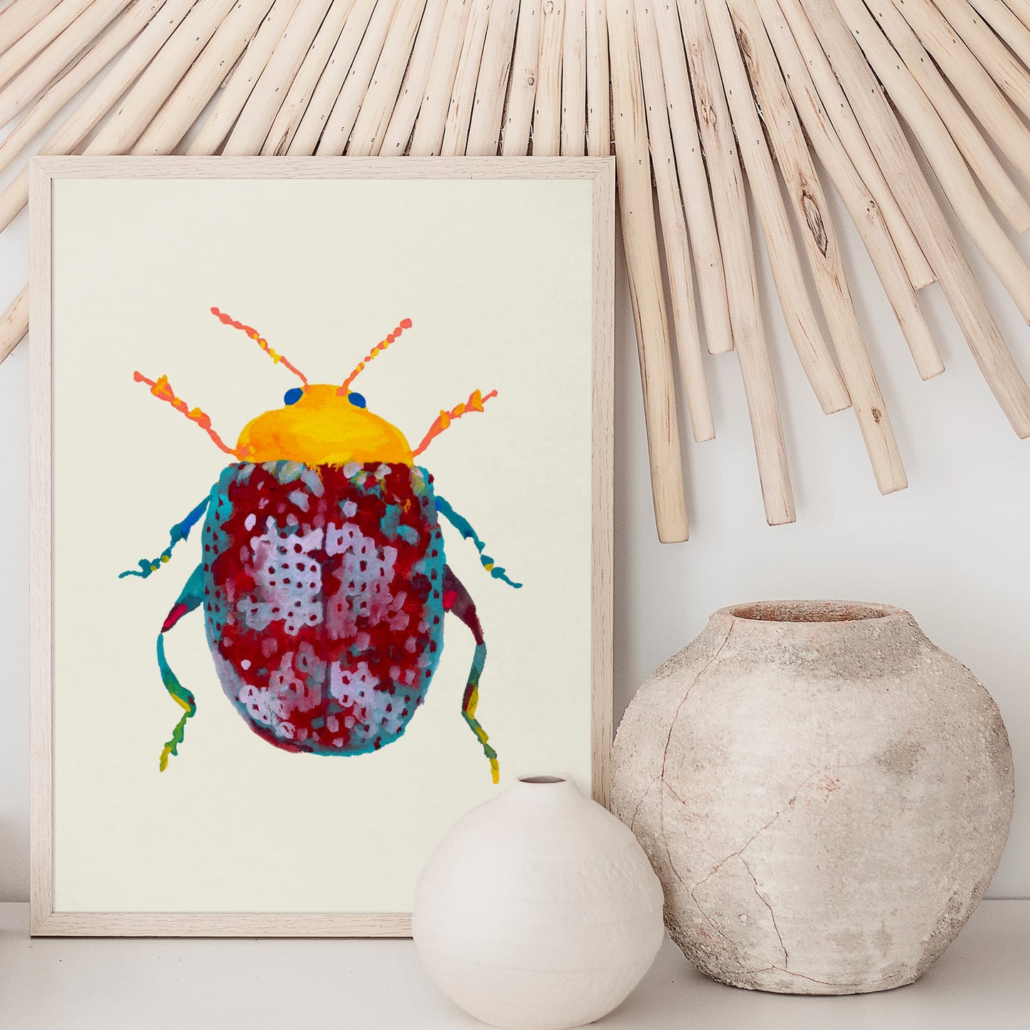 Colorful beetle illustration in a frame on a wall with decorative elements.