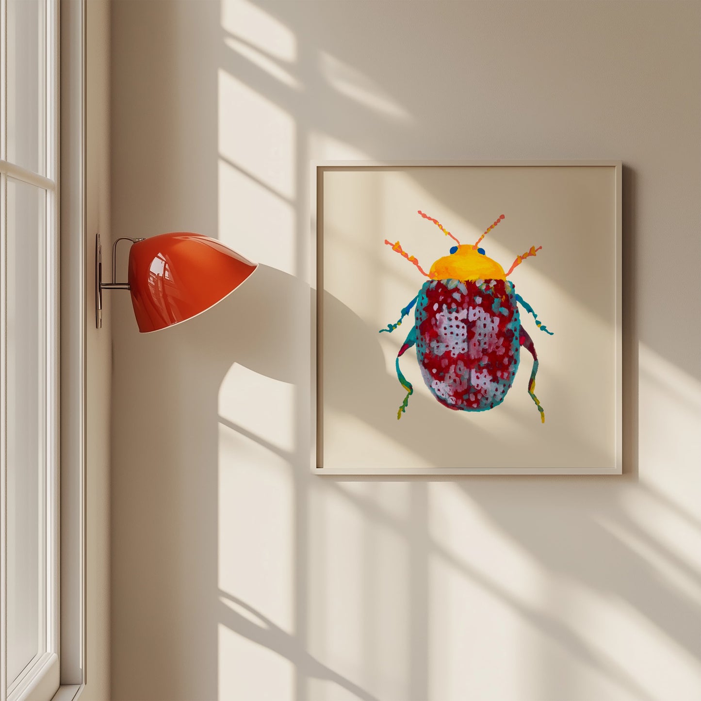 Framed artwork of a colorful beetle on a wall with a lamp casting shadows.
