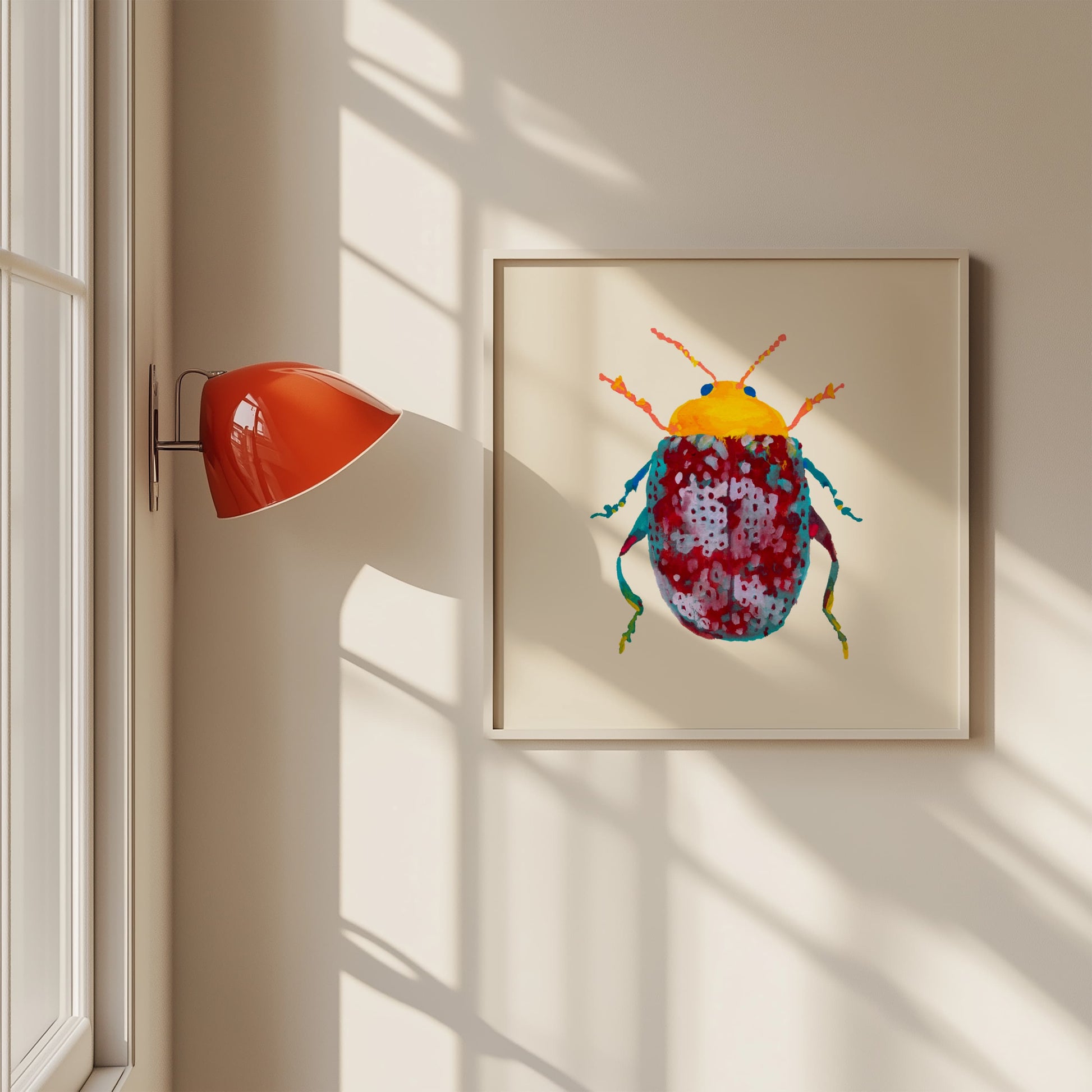 Framed artwork of a colorful beetle on a wall with a lamp casting shadows.