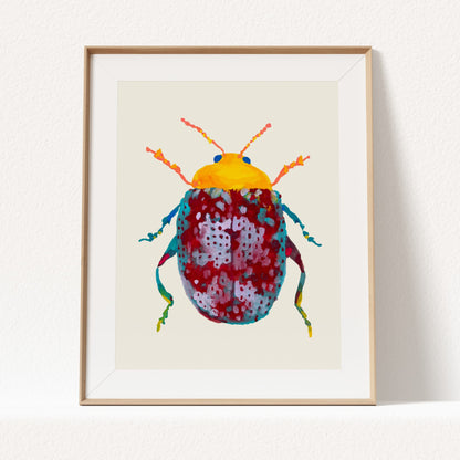 Framed artwork of a colorful beetle on a beige background