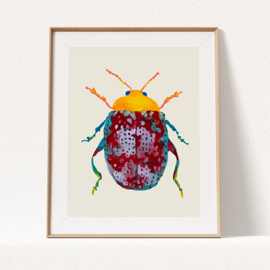Framed artwork of a colorful beetle on a beige background