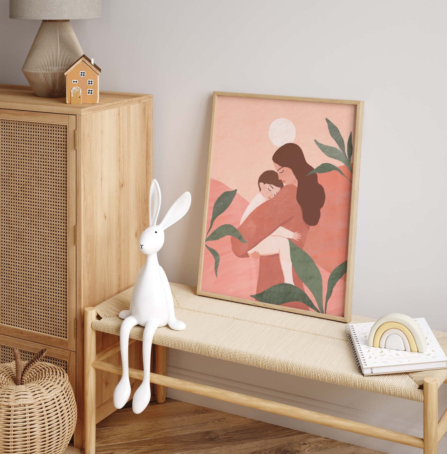 Gentle art print of a mother holding her sleeping baby, set against a tranquil backdrop of earthy tones and soft greens – serene illustration celebrating the beautiful bond between mother and child