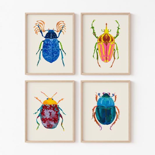 Four colorful beetle illustrations in wooden frames on a white background