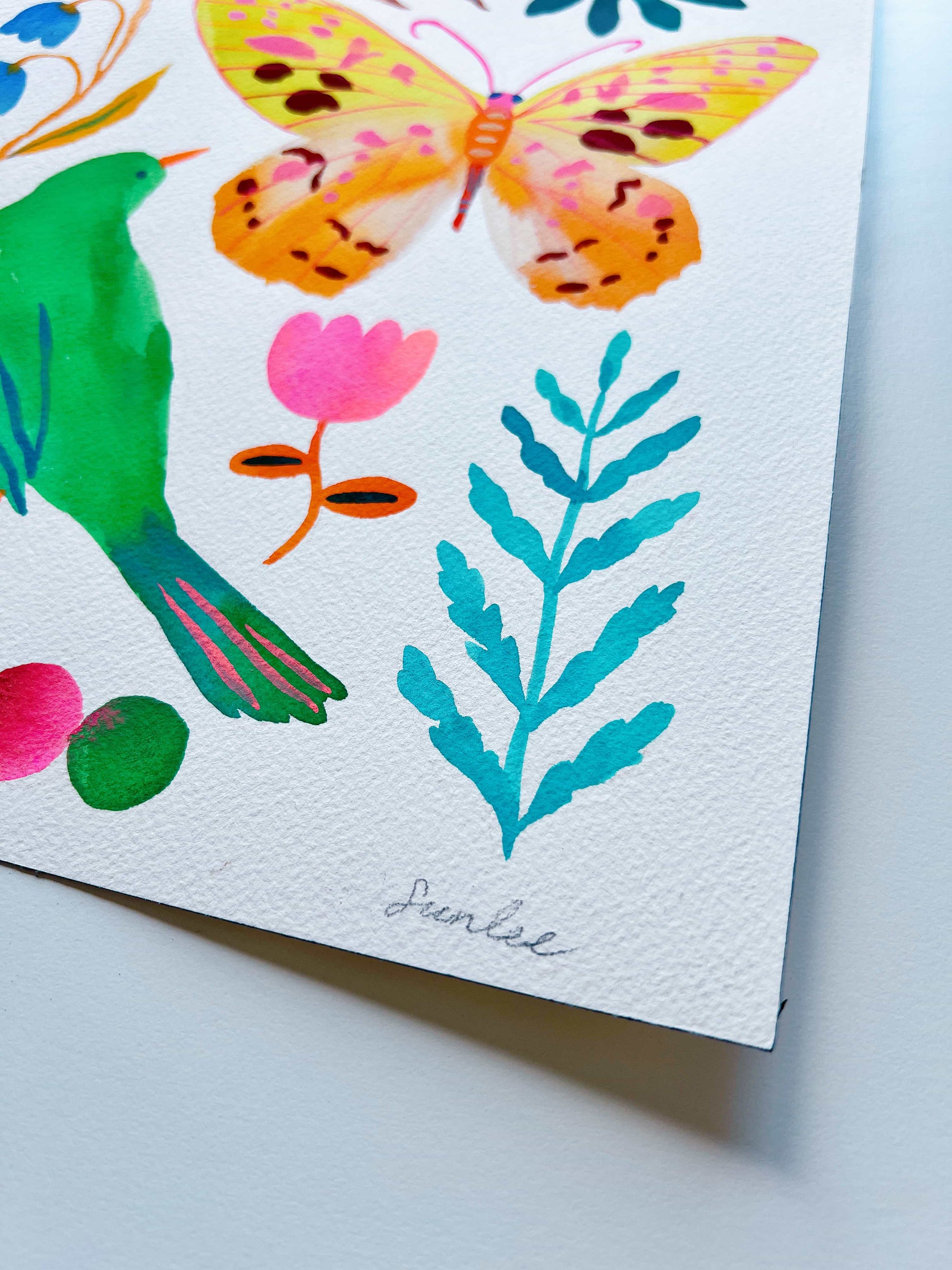 Original gouache, watercolor, and acrylic painting by Sun Lee from the 'Whispers of Spring' collection. This vibrant piece features a whimsical depiction of nature with bright flowers, butterflies, and birds, capturing the energy and beauty of spring. Perfect for nature lovers and those seeking aesthetic watercolor and gouache artwork, bringing joy and color to your space.